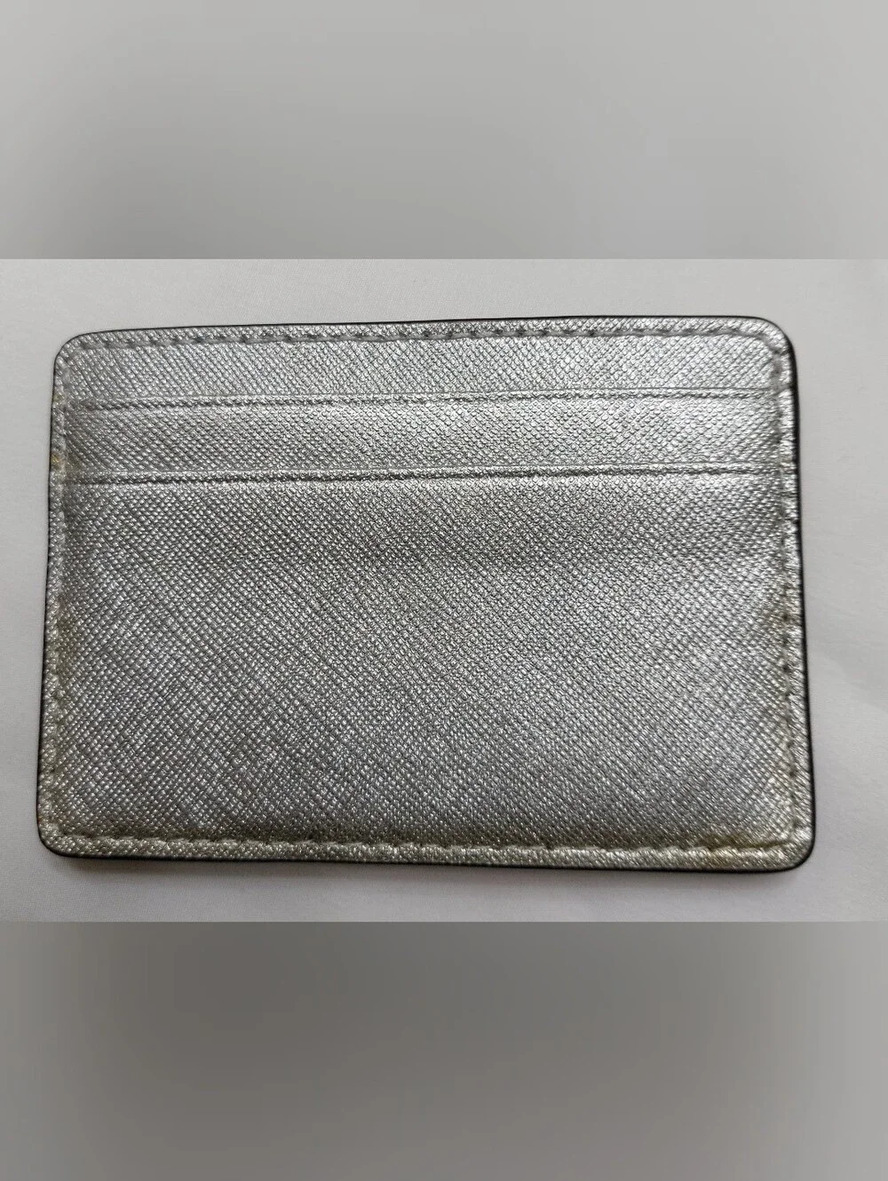 Michael Kors Metallic Silver Logo Clutch Wallet
